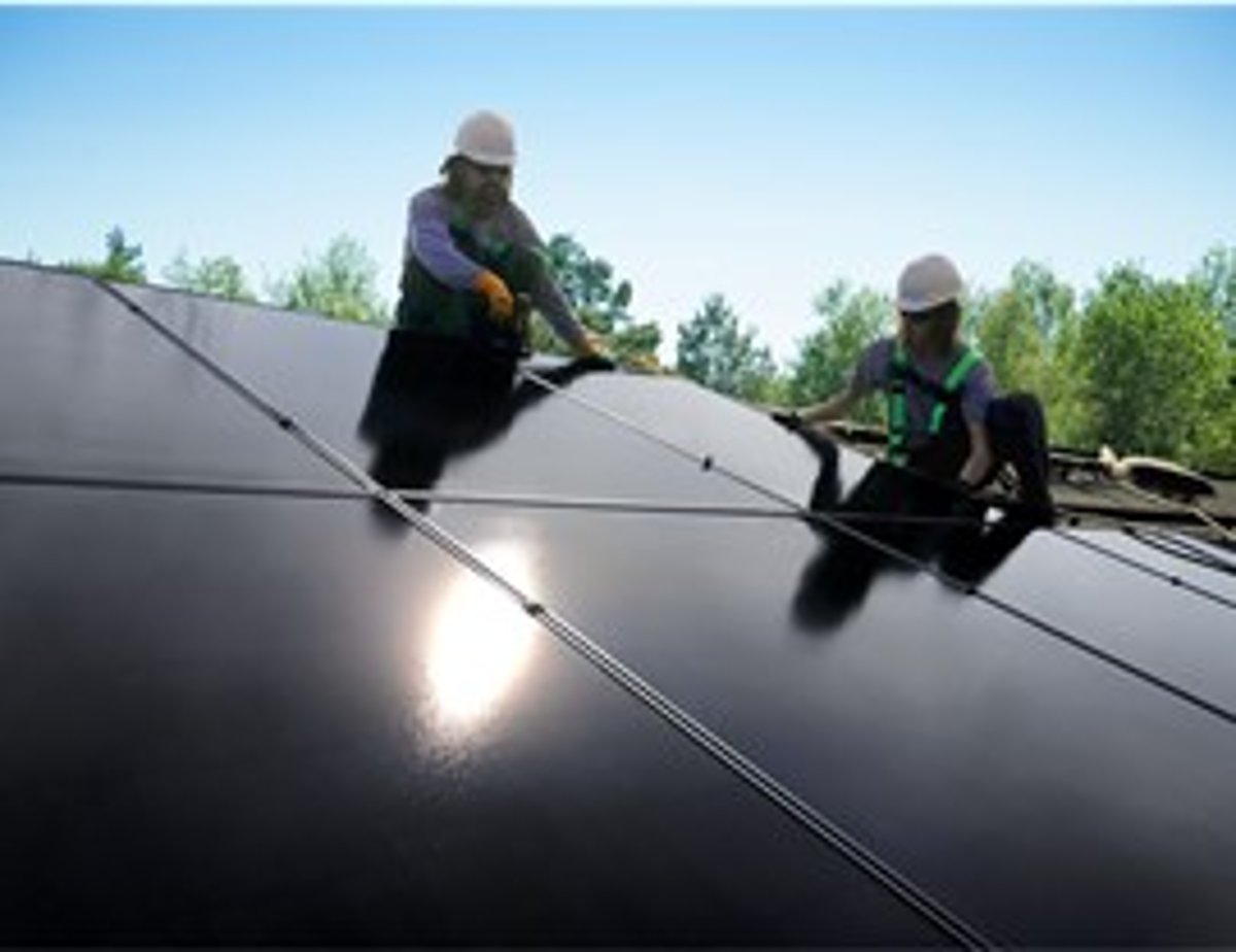 Technicians installing solar panels for Shinnova project