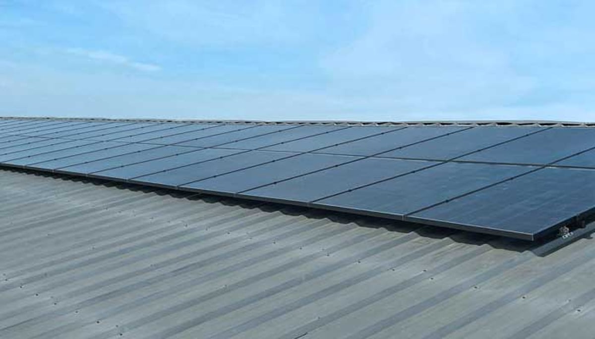 Commercial solar panels installed by Shinnova on a metal roof for energy savings